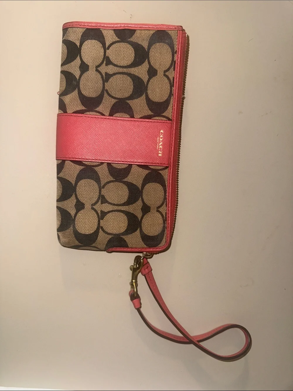 Coach Signature Canvas Wristlet in pink and Tan